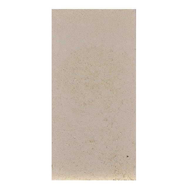 Un mattone refrattario formato che misura duecentocinquanta per centoventiquattro millimetri e venti di spessore